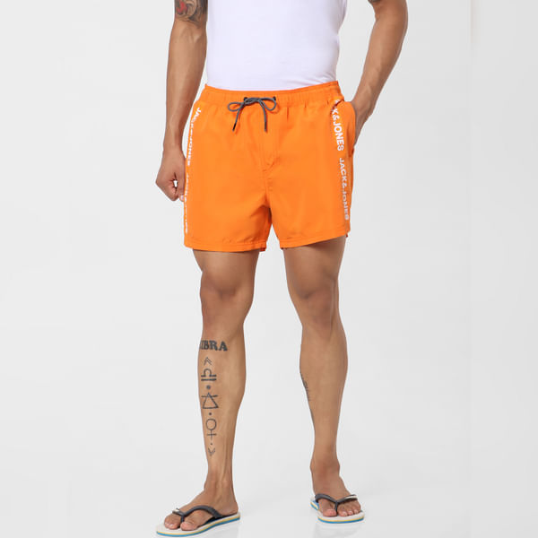BESTSELLER CLOTHING Orange Mid Rise Logo Print Tape Detail Drawstring Swimshorts
BESTSELLER CLOTHING Orange Mid Rise Logo Print Tape Detail Drawstring Swimshorts