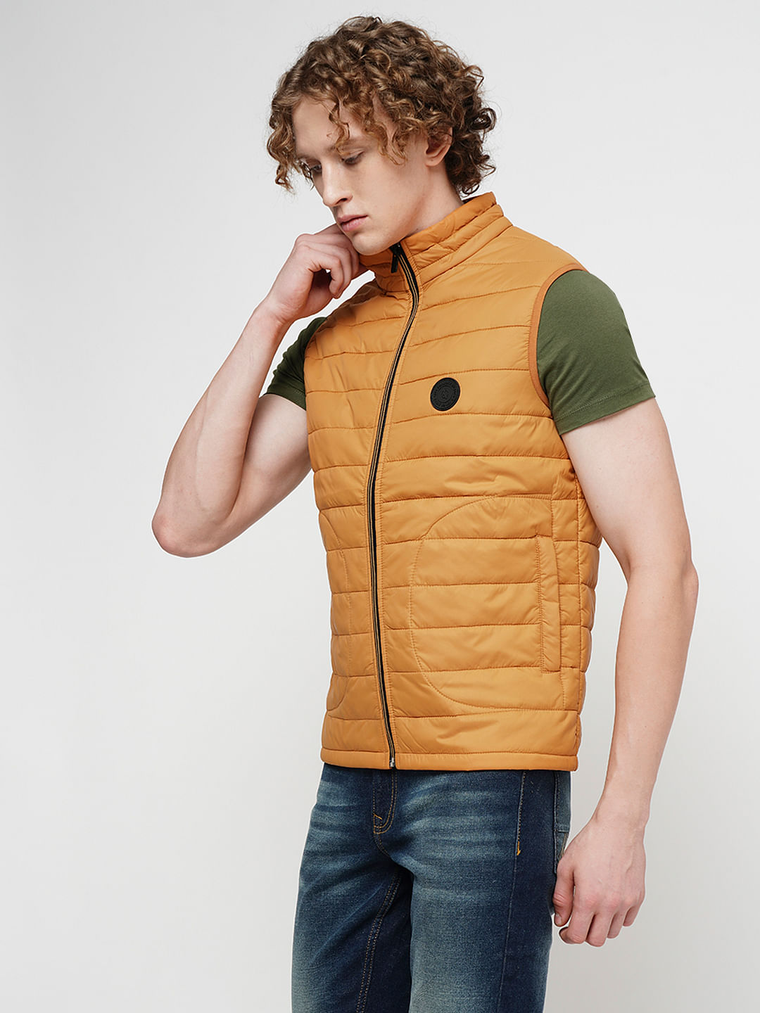 Puffer vest hotsell with sweater sleeves