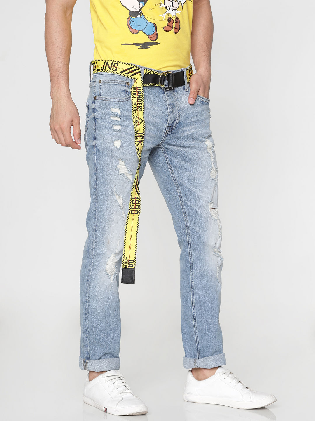 light blue ripped slim fit jeans