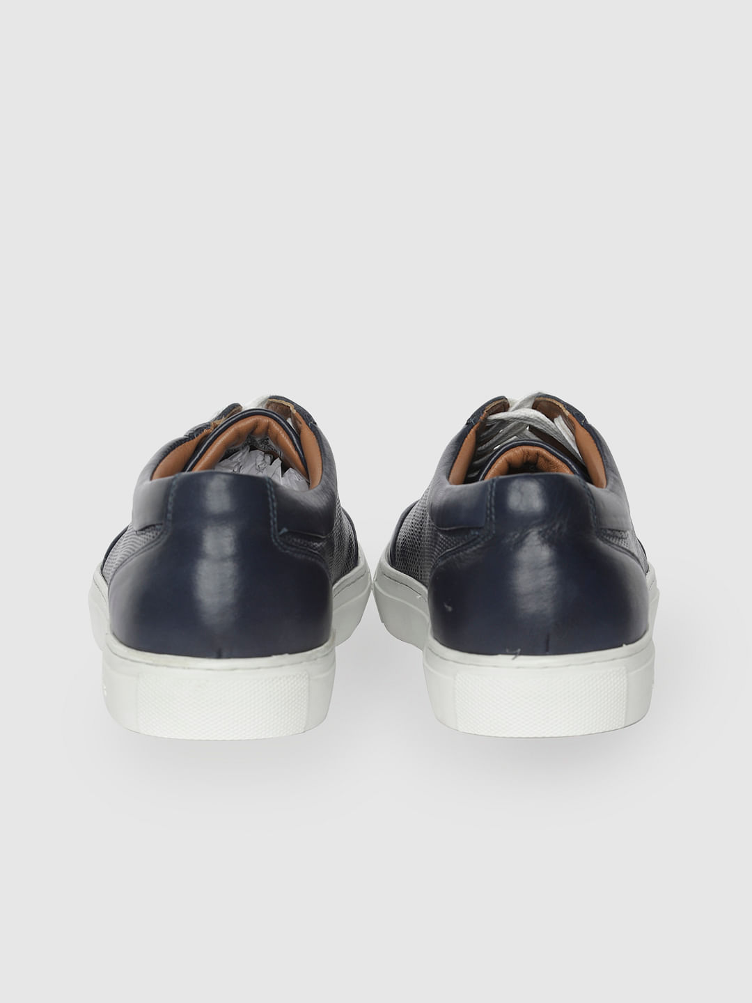 navy blue leather sneakers