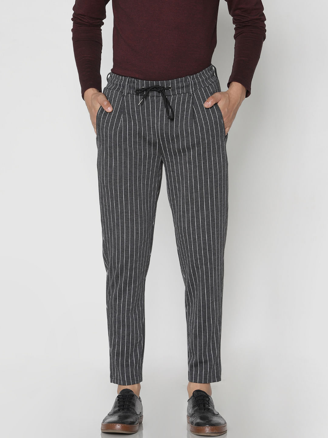 grey and black striped pants