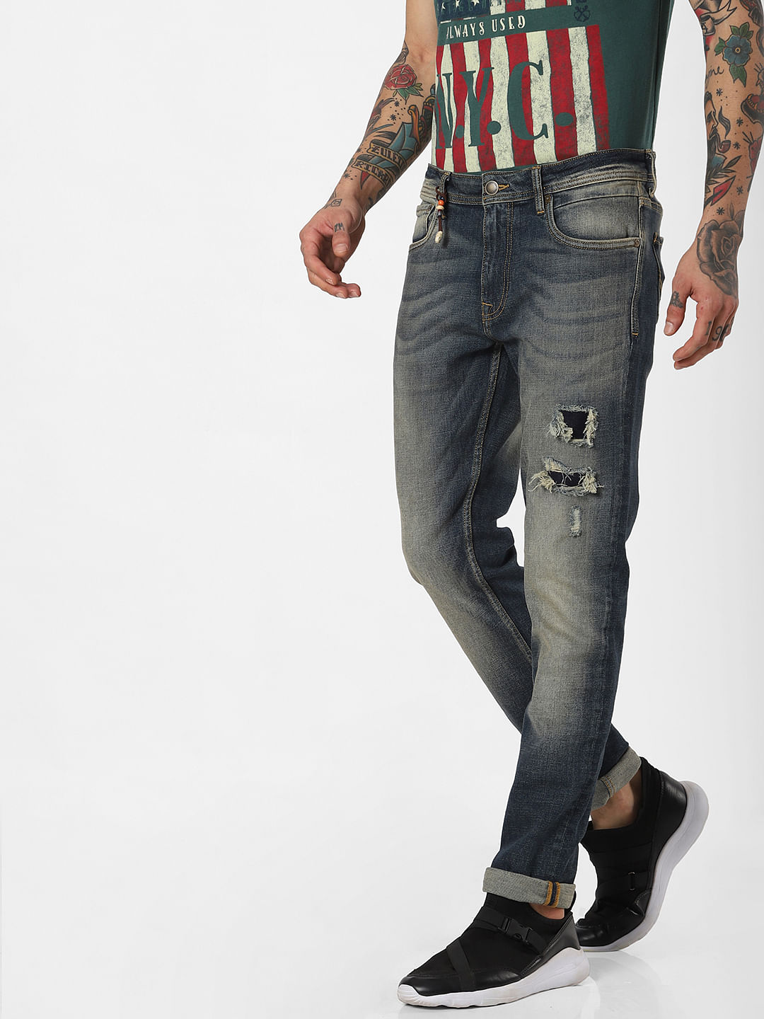 low rise ripped skinny jeans