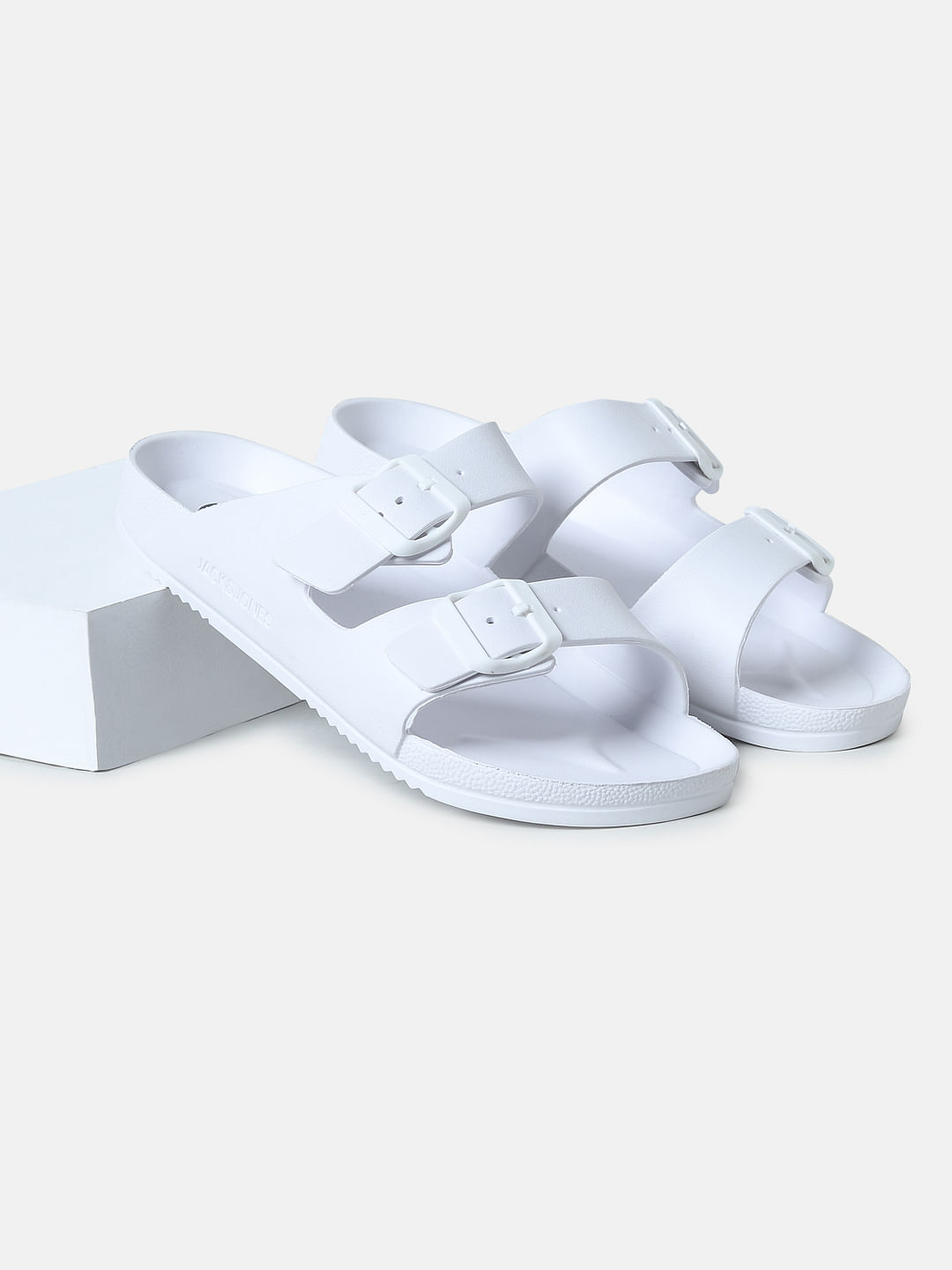 White sandals with online studs