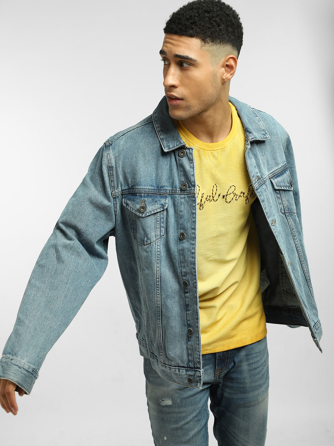 Handsome Hipster White Shirt Yellow Background Buttoning His Denim Jacket  Stock Photo by ©pavelborn 364473546