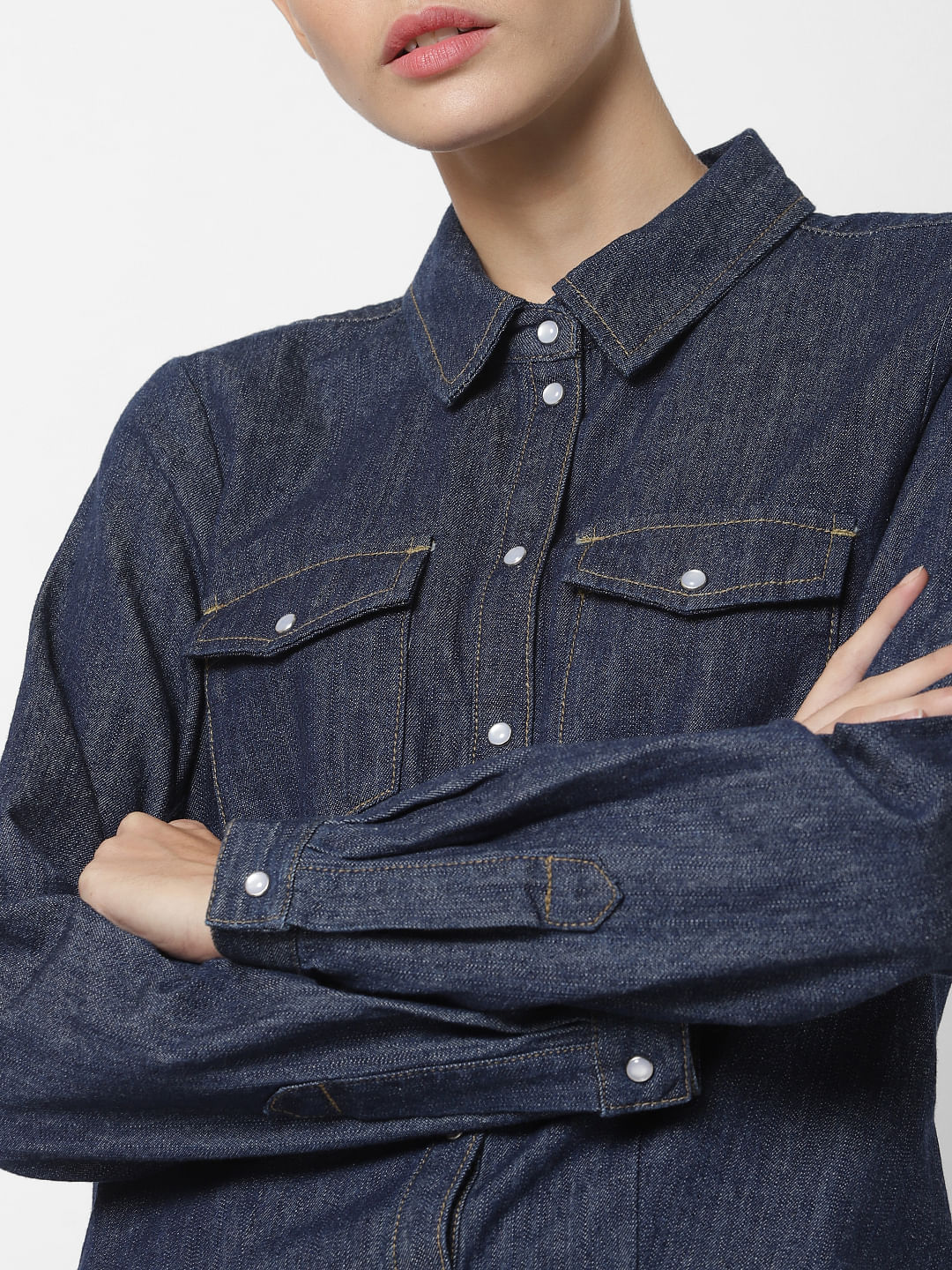 shirt on dark blue jeans