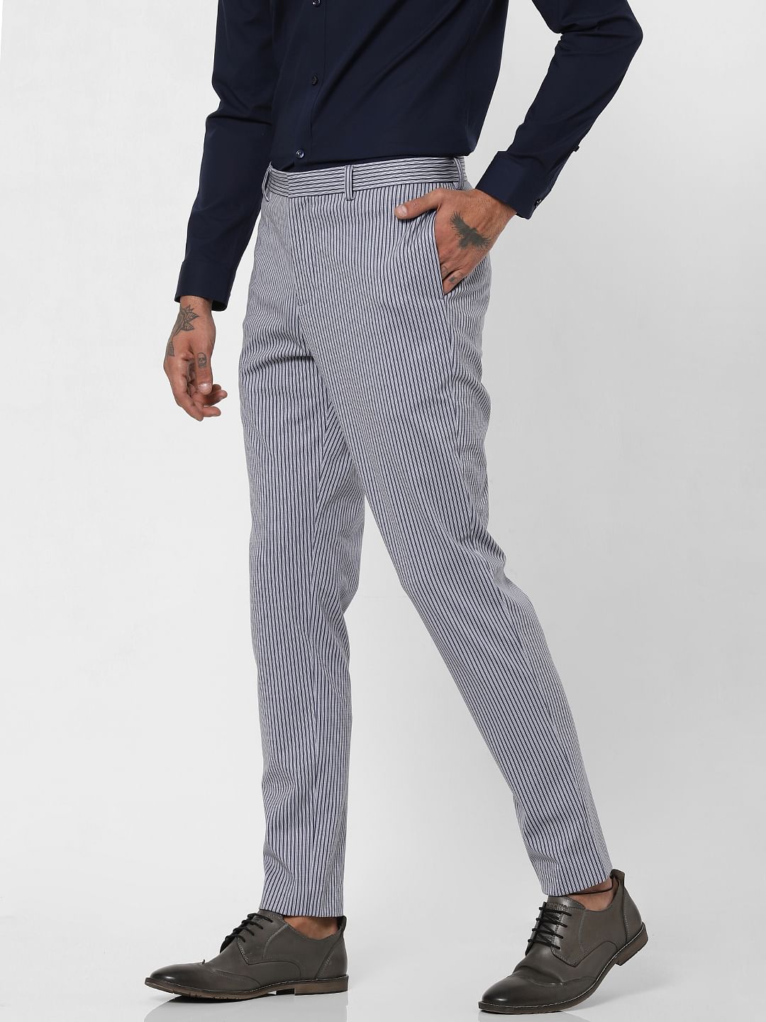 grey and white striped trousers