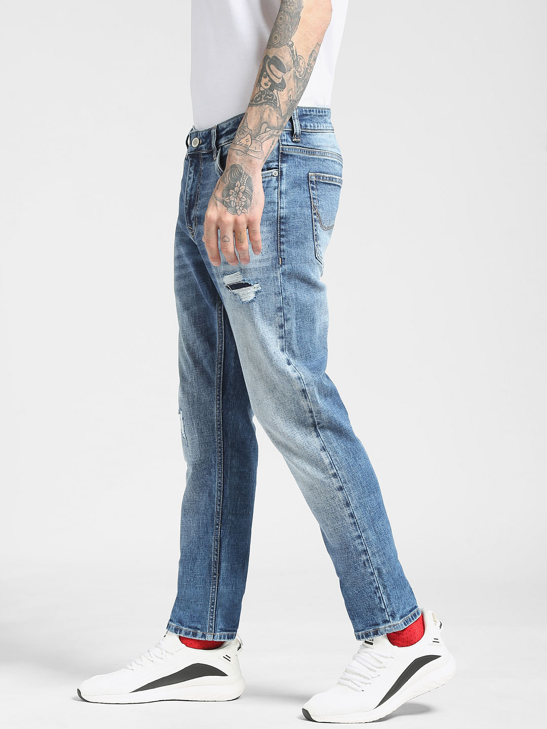 Ripped slim taper fit store jeans