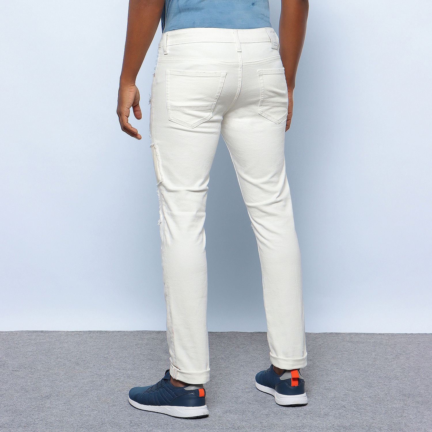 white accidental jeans