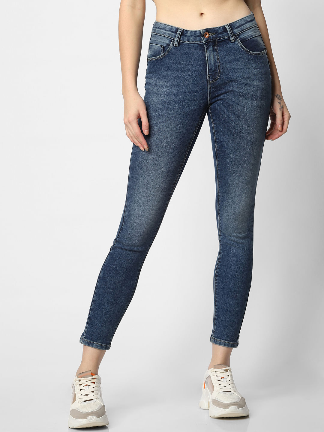 mid blue skinny jeans womens