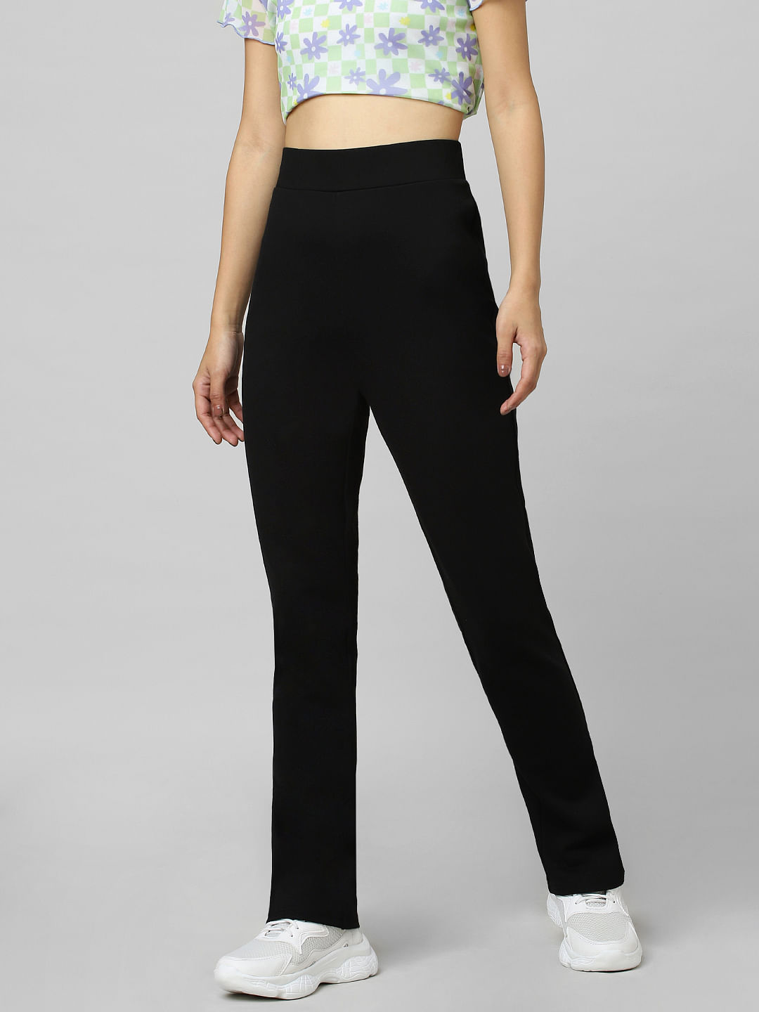 Evie high-rise split-hem pants in black - Rebecca Vallance | Mytheresa