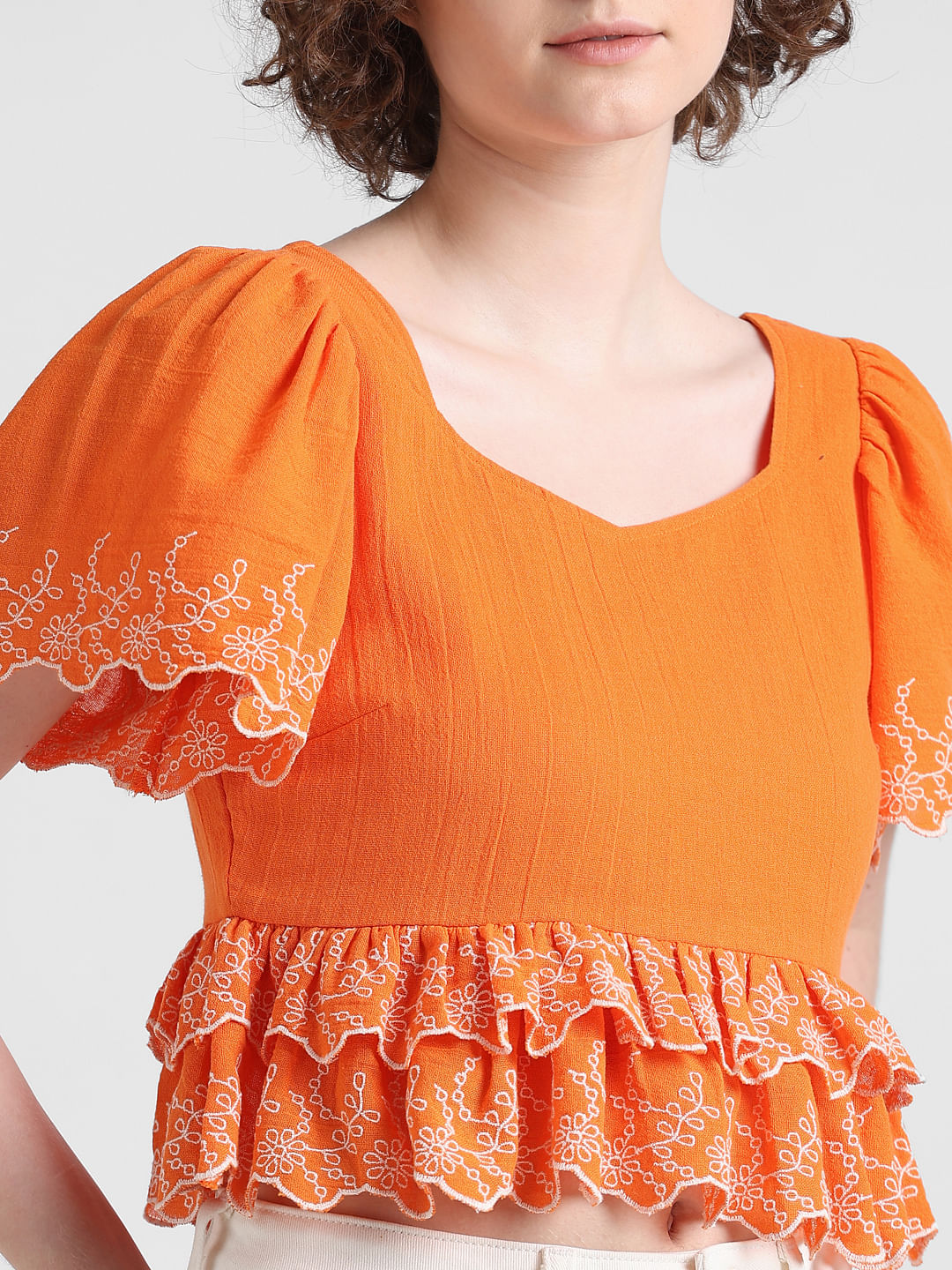 Orange ruffle store sleeve top