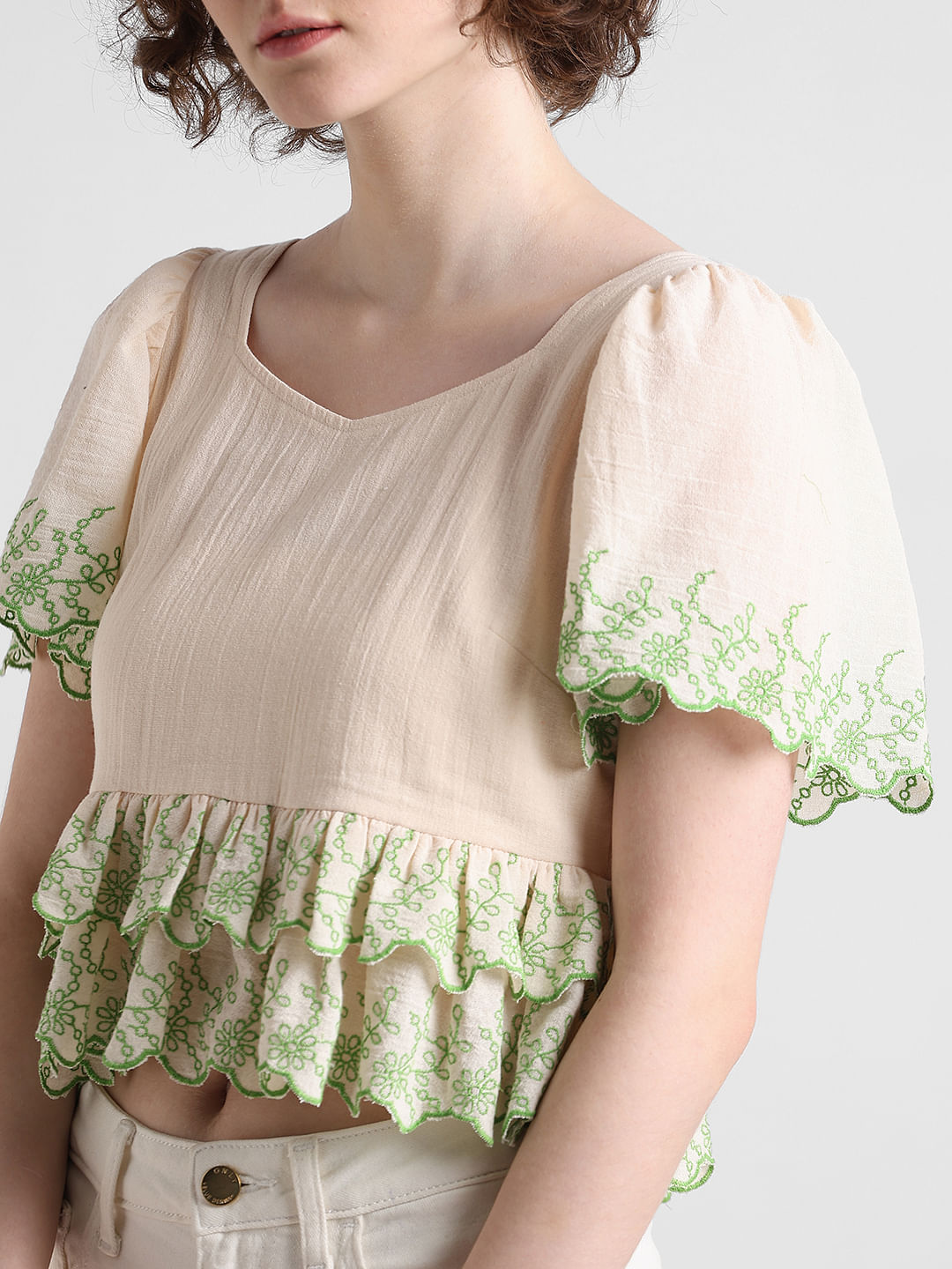 Embroidered best sale ruffle top