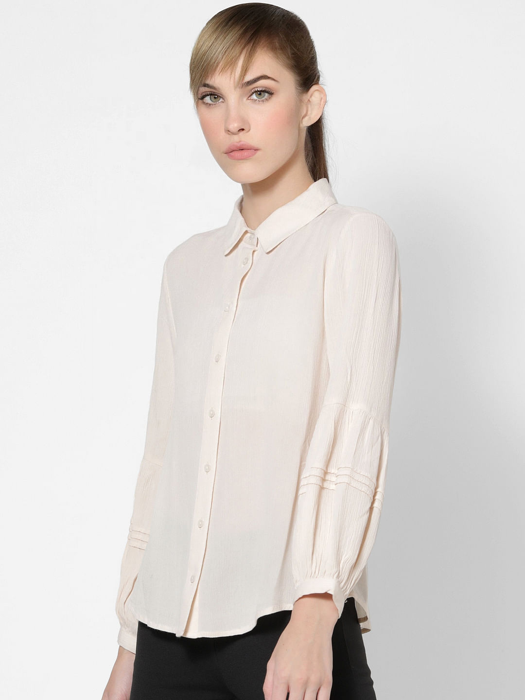 women's light pink button down shirt
