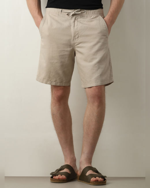 Beige Mid Rise Drawstring Linen Shorts