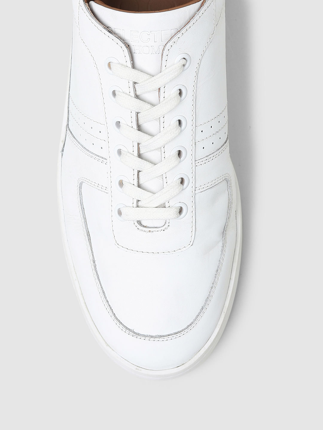 How to Clean White Shoes: Sneakers, Canvas, & More