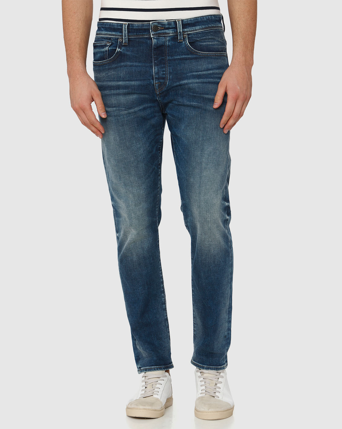 tapered fit mid rise jeans