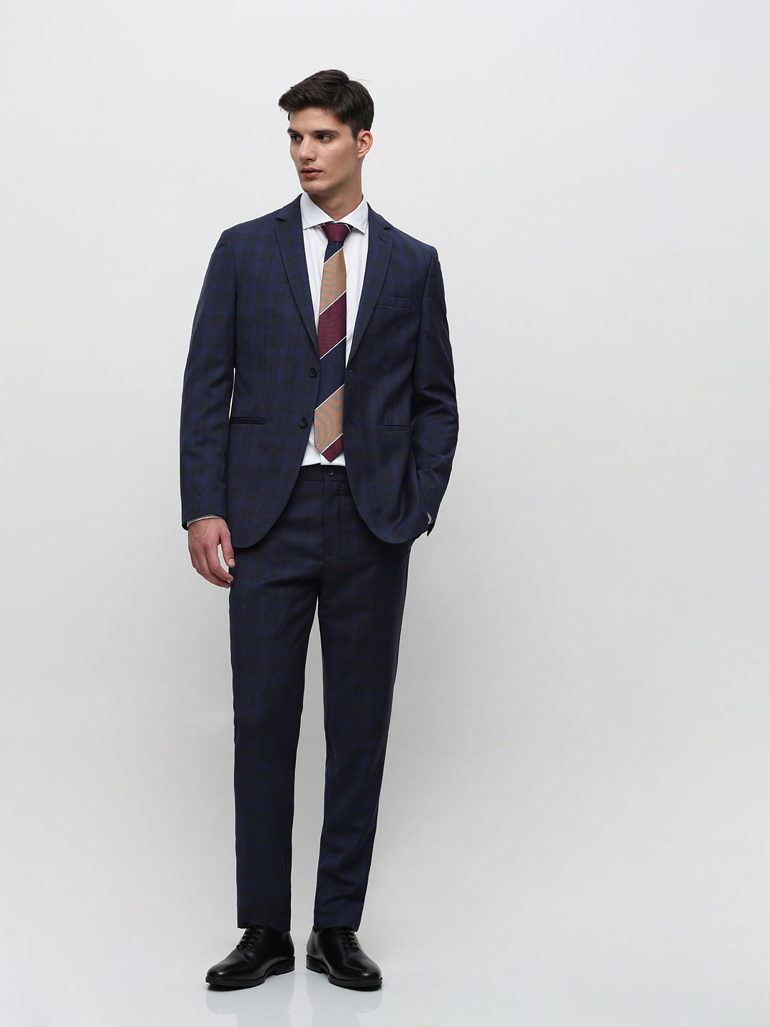 Learning from Bond: A Checked Jacket and Flannel Trousers – Bond Suits