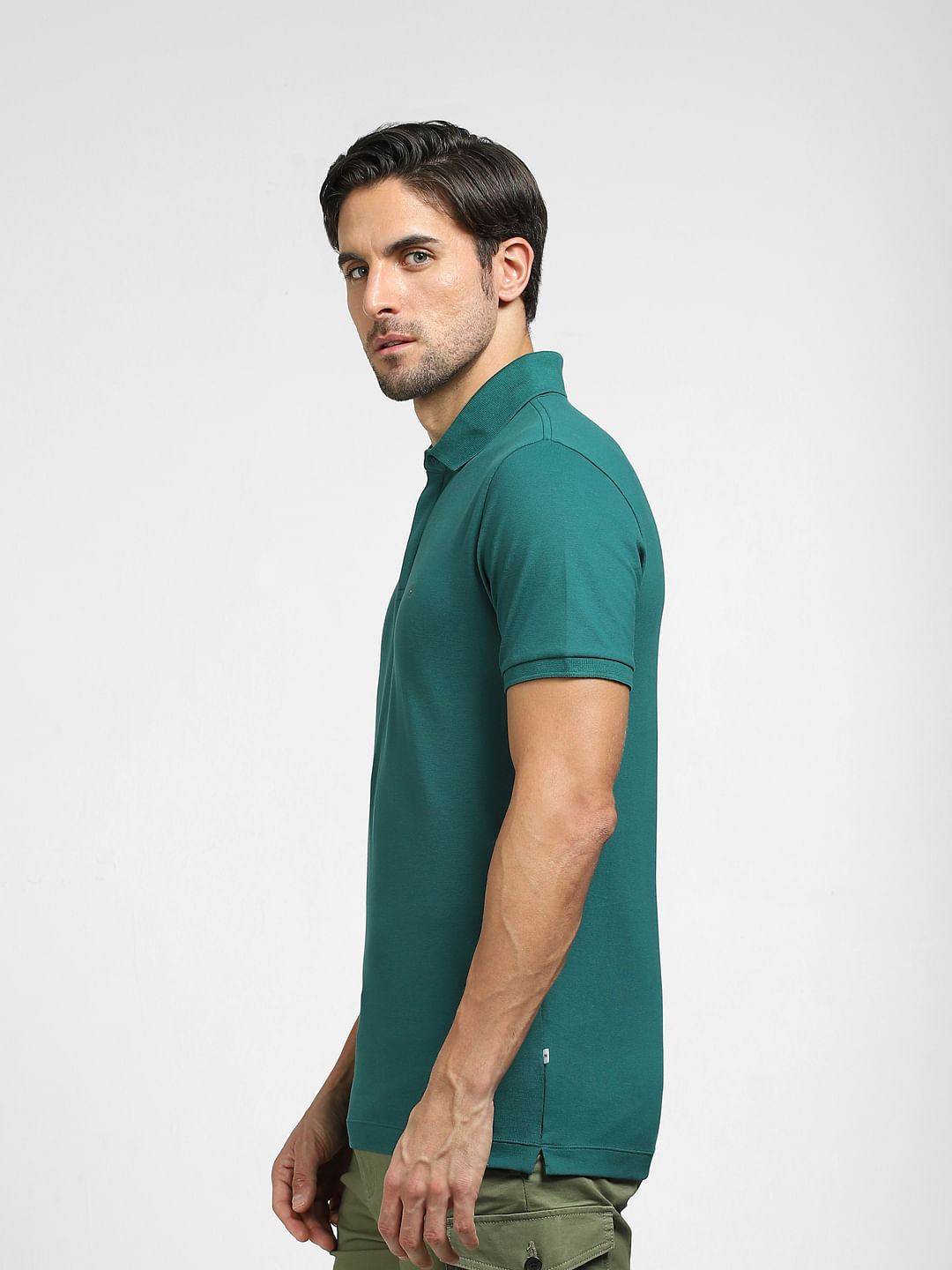 Green polo neck outlet top