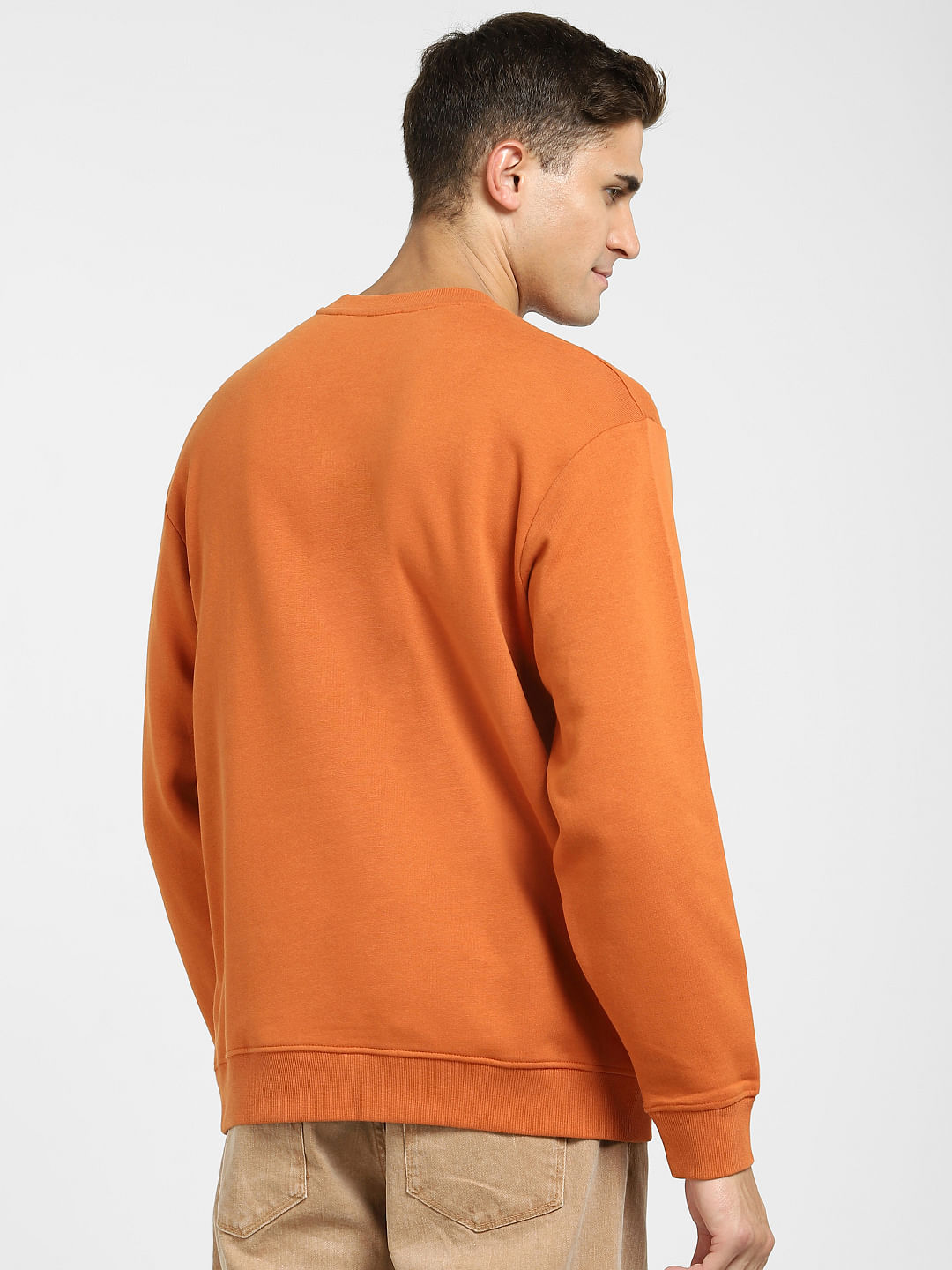 Orange and cheap grey sweatshirt