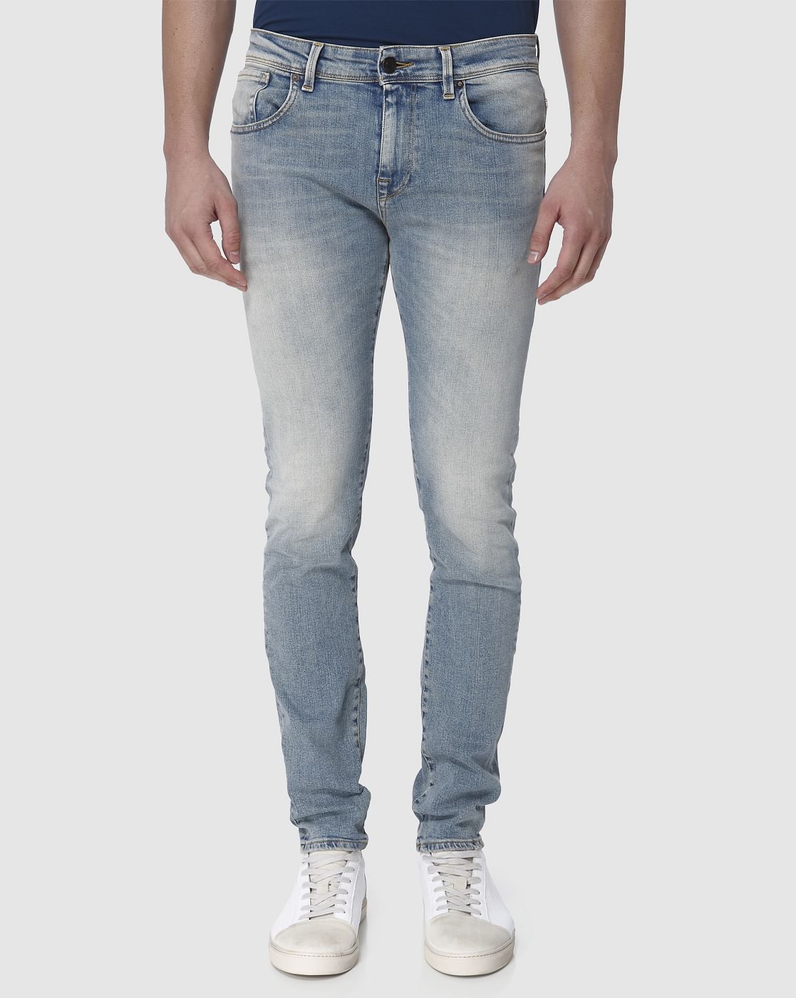 light blue faded jeans