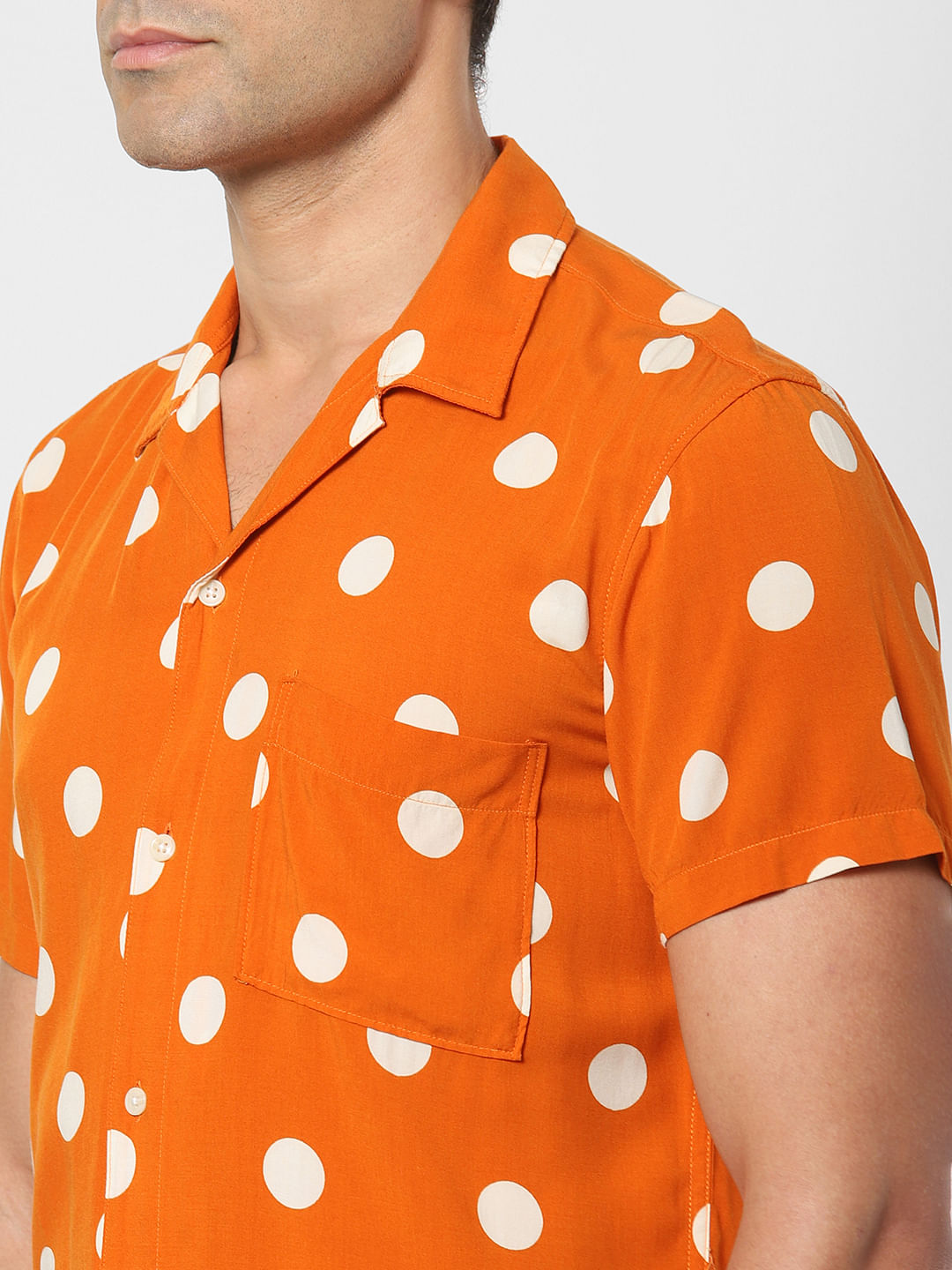 orange polka dot shirt