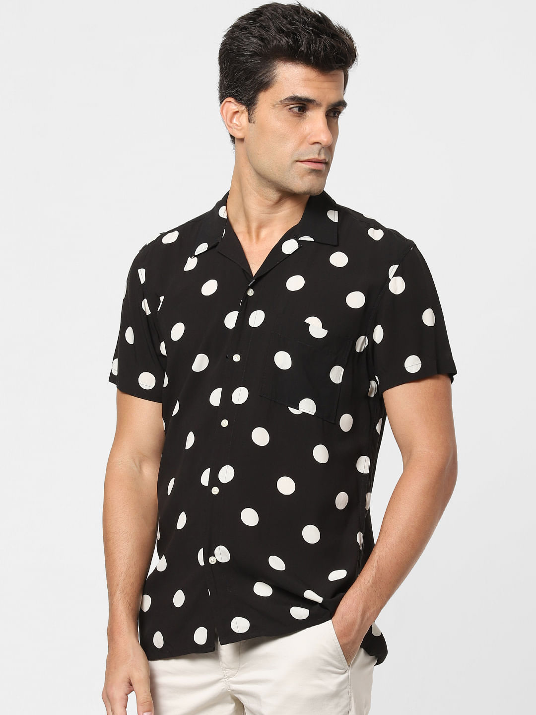 black polka dot button down shirt