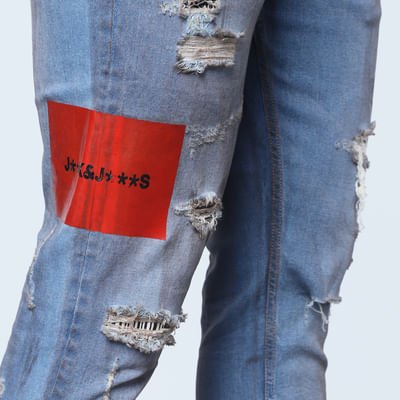 Blue Mid Rise Heavily Distressed Slim Jeans 