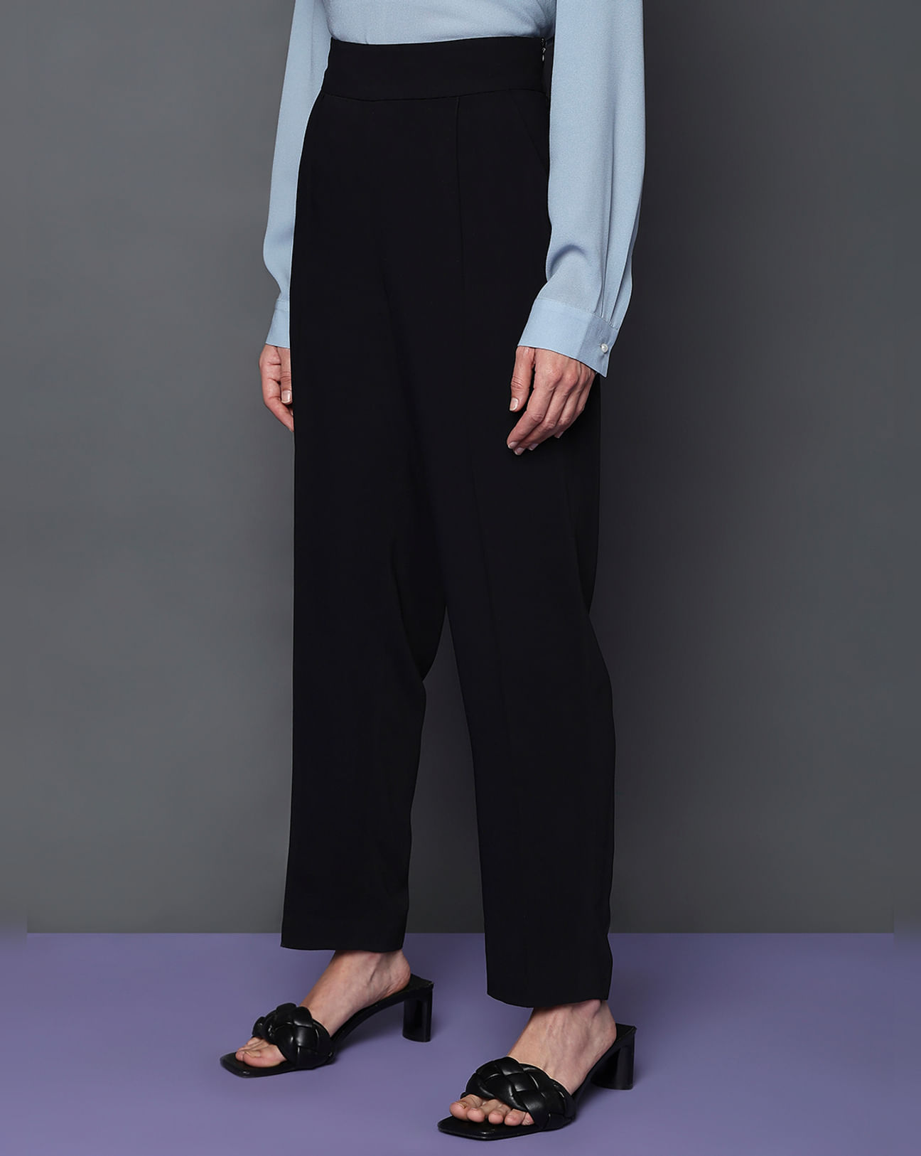 high-waisted pants with tapered legs