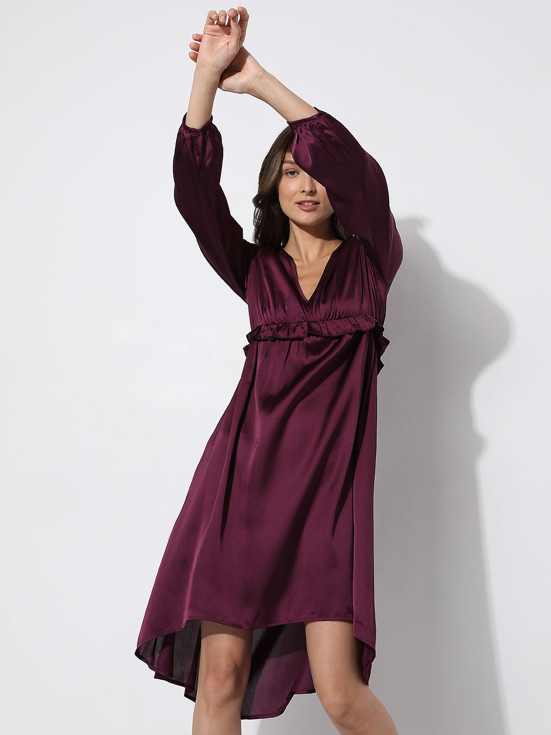 LEILA GOLD COLOR GLOSSY SATIN FABRIC KNEE LENGTH DRESS WITH LONG SLEEVES  AND PLEAT DETAILING AT