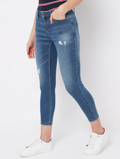 Light Blue Mid Rise Distressed Wendy Skinny Jeans