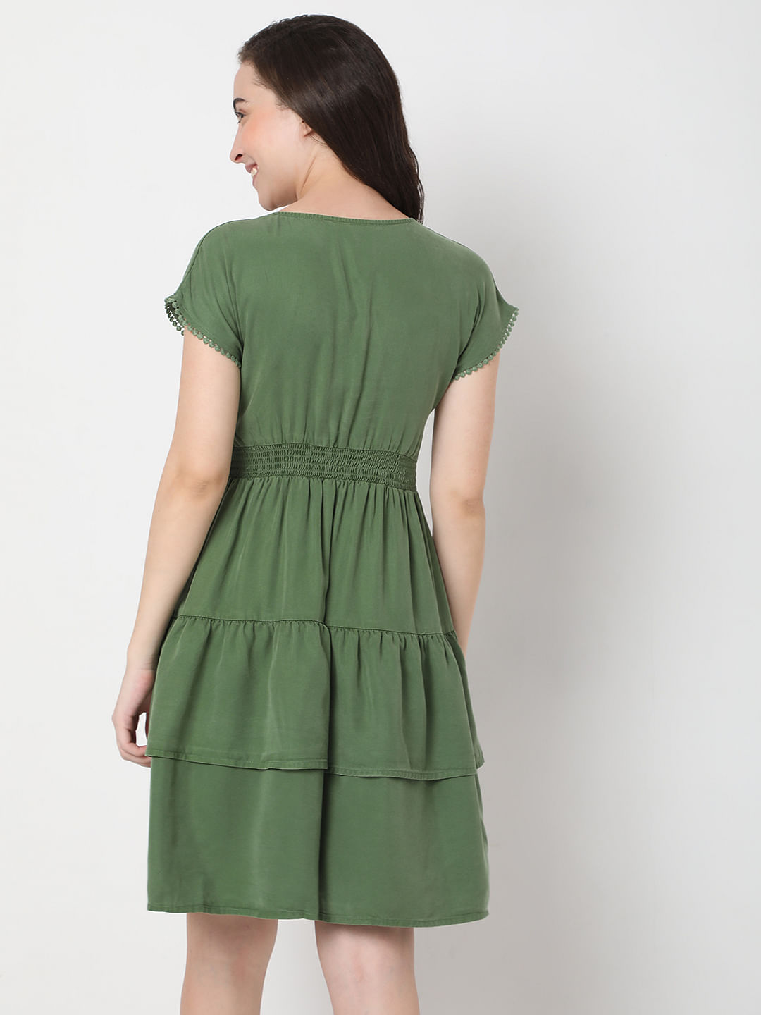 green fit and flare dress with sleeves