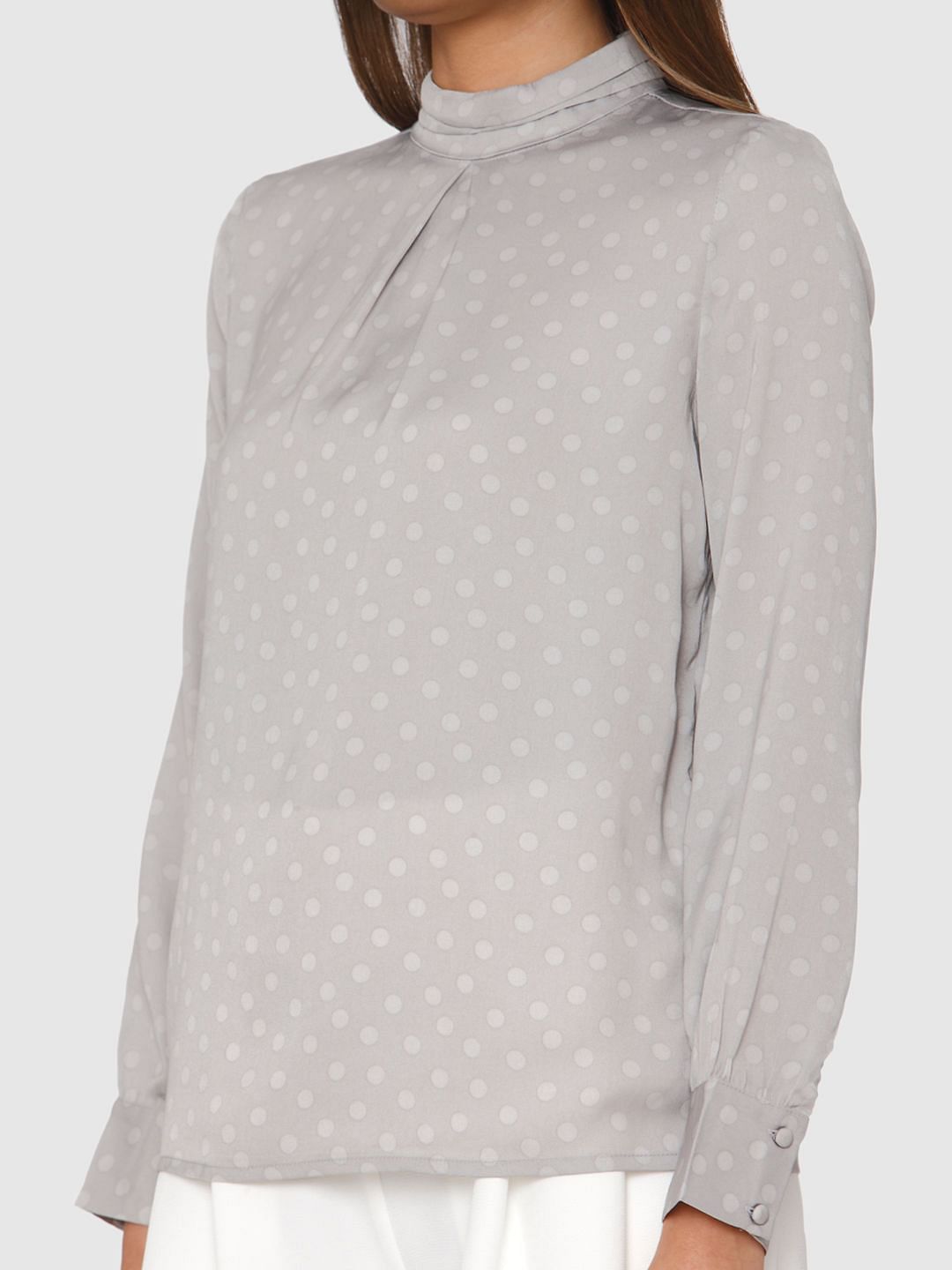 grey polka dot shirt