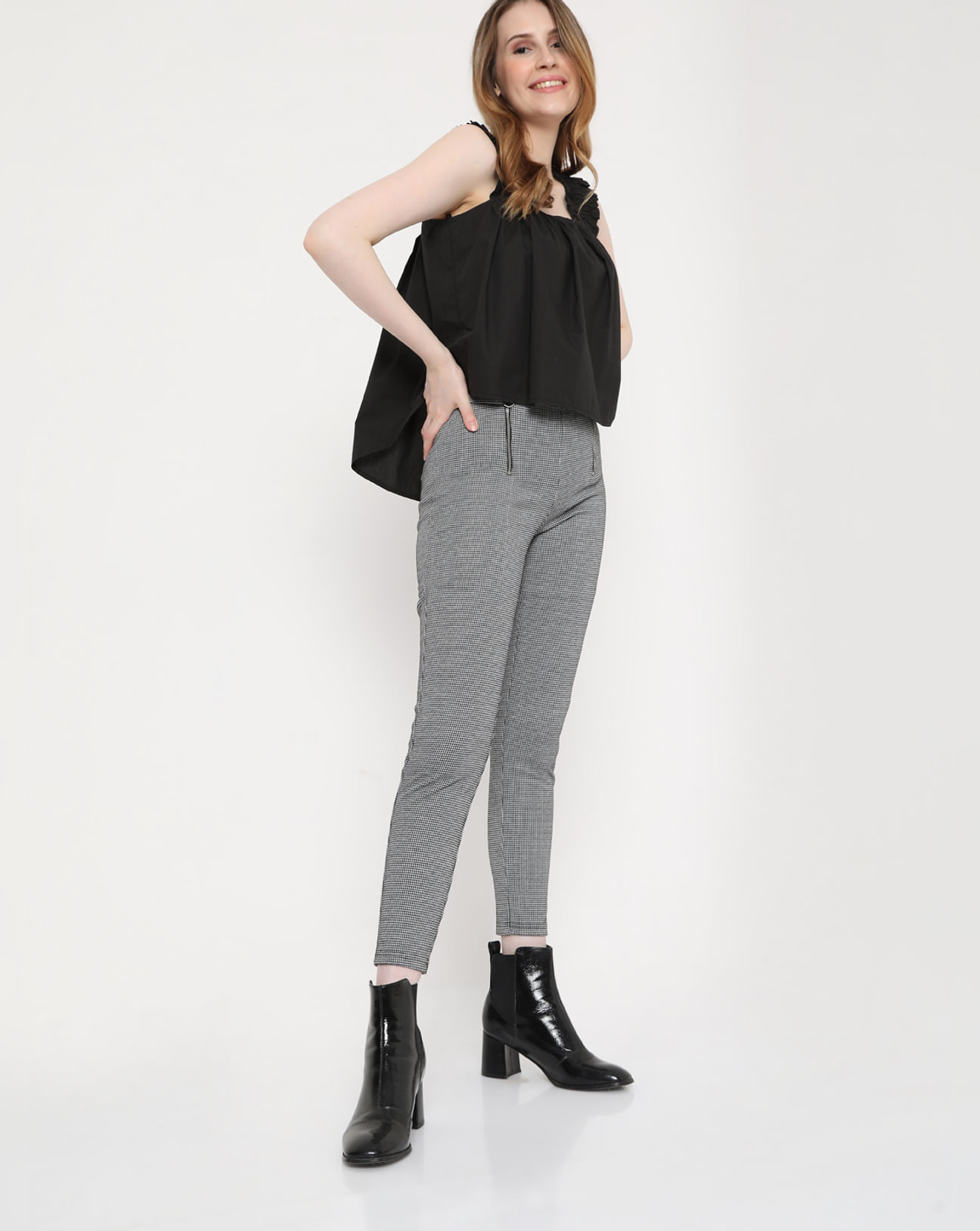 Buy Black High Rise Houndstooth Jeggings Online In India.