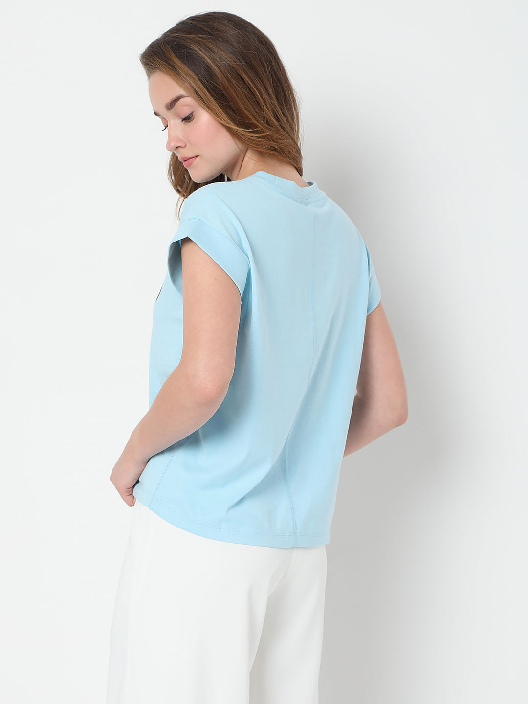 white and sky blue graphic tee
